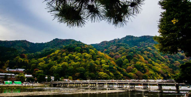 Long wooden bridge in Arashiyama, Kyoto, Japan Long wooden bridge in Arashiyama, Kyoto, Japan